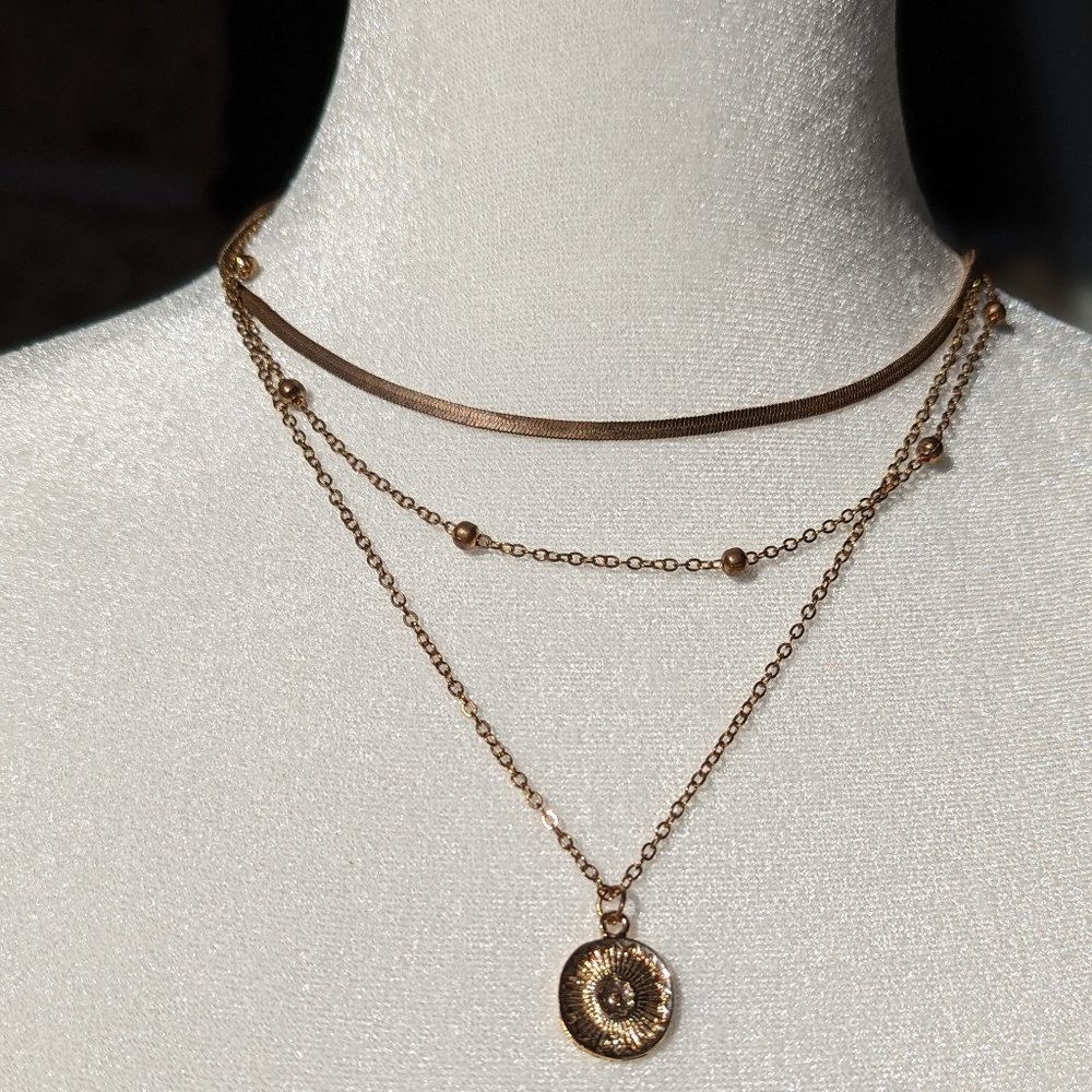 Triple layer golden lotus pendant, beaded, choker necklace.